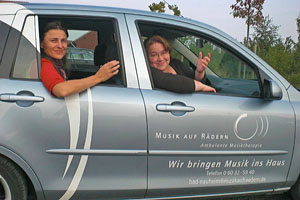 Auto mit Musik auf Rädern Aufdruck